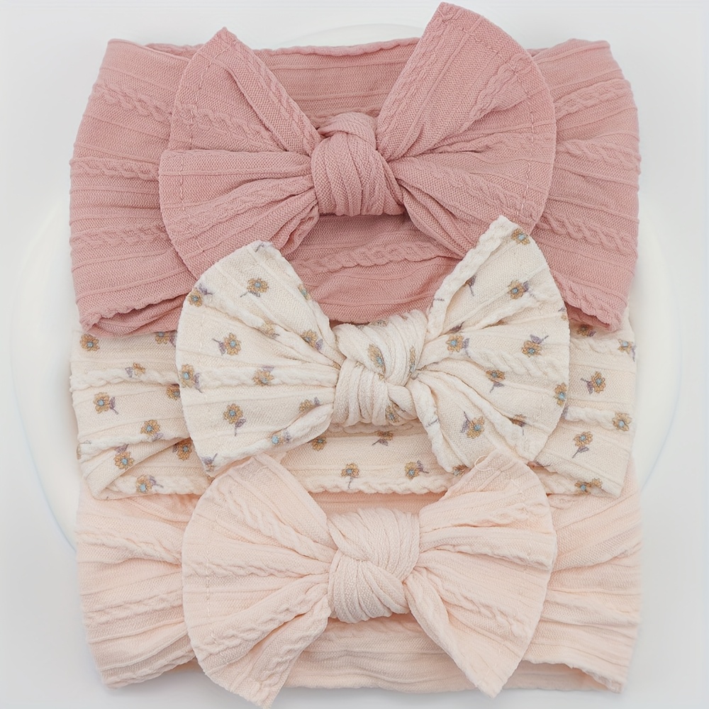 product-fancy-dd959be6-59e8-41c2-851a-c88b78245f55 Baby Haarbanden met Strik - Image 1