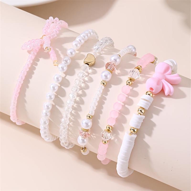 product-fancy-6a0f91ba-030c-4caf-96f5-d5f1eae459f3 Roze Armbanden - Image 1